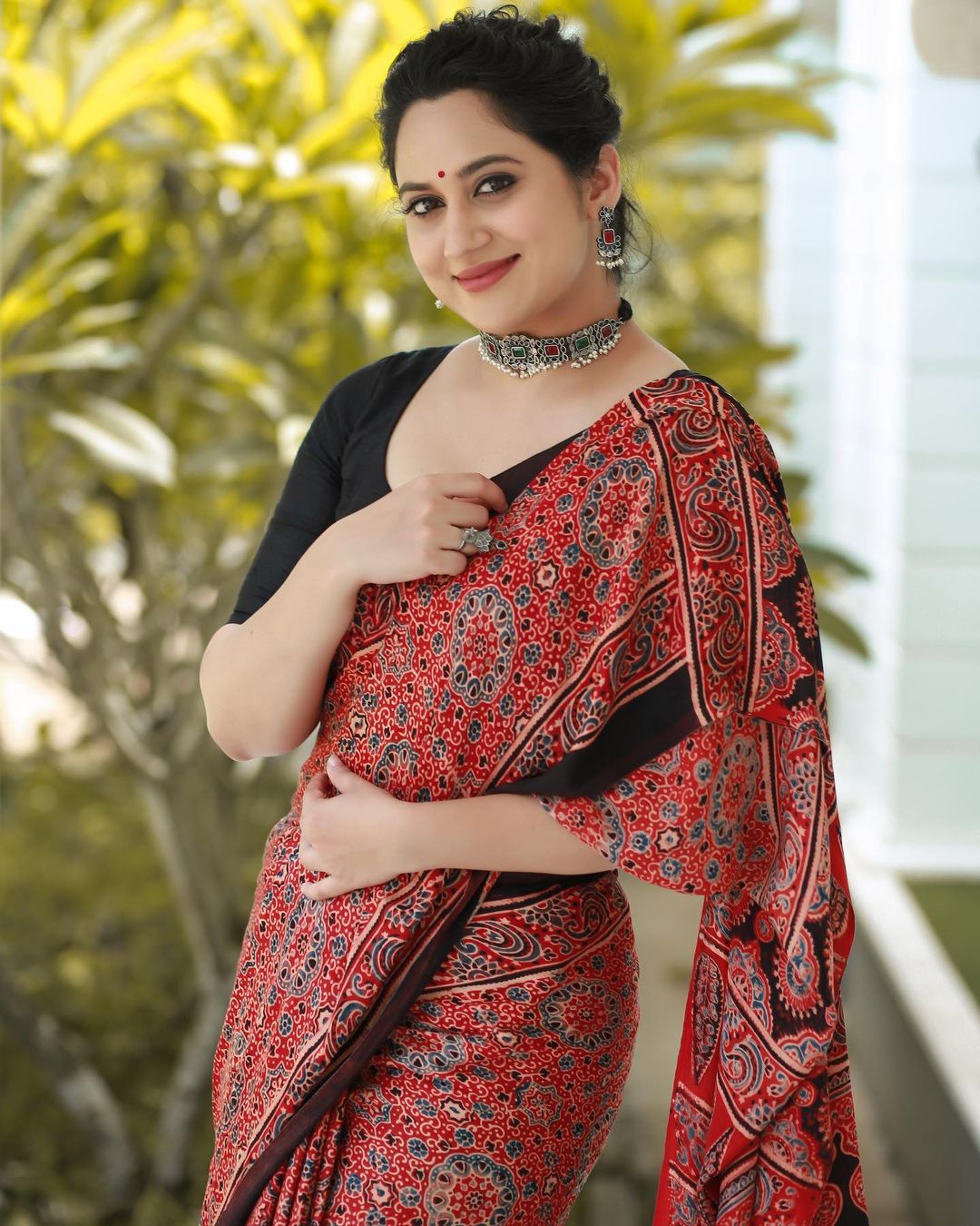 Malayalam Actress Miya George Images in Maroon Saree Black Blouse